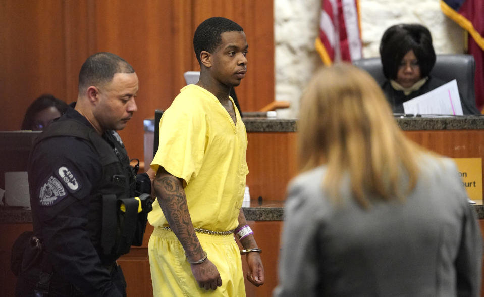 Larry D. Woodruffe, center, is escorted from the courtroom after a hearing Thursday, Jan. 10, 2019, in Houston. Woodruffe is charged with capital murder in the Dec. 30, 2018 slaying of 7-year-old Jazmine Barnes. (AP Photo/David J. Phillip)