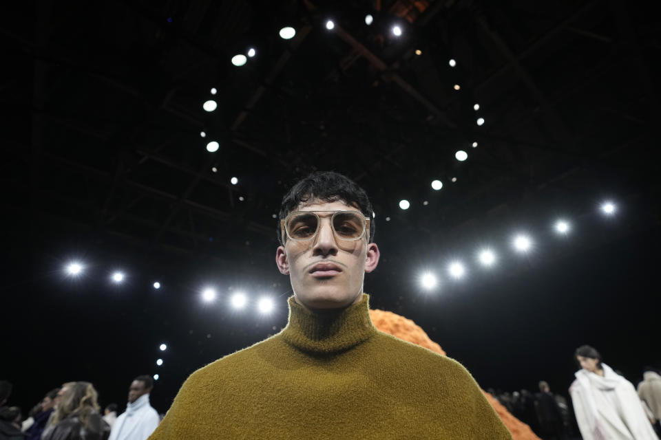 A model wears a creation part of the Zegna men's Fall-Winter 2024-2025 collection, that was presented in Milan, Italy, Monday, Jan. 15, 2024. (AP Photo/Luca Bruno).