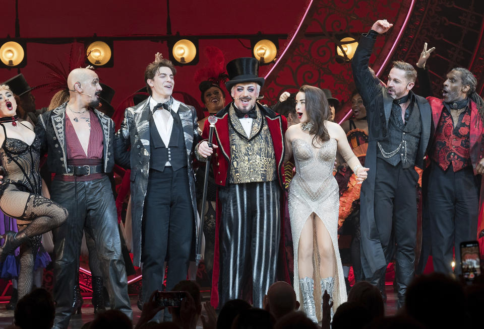 Boy George, center, is pictured with cast members on stage during the curtain call for his debut performance in "Moulin Rouge! The Musical" at the Al Hirschfeld Theatre on Tuesday, Feb. 6, 2024, in New York. (Photo by Evan Agostini/Invision/AP)