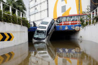 <p>A vehicle damaged by Typhoon Hato is seen in Macau, China, Aug. 24, 2017. (Photo: Tyrone Siu/Reuters) </p>