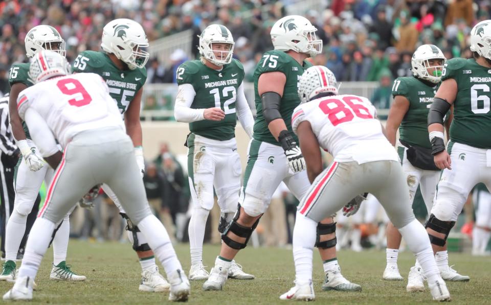 Michigan State's Rocky Lombardi runs the offense against Ohio State during the second half of the 26-6 loss to Ohio State on Saturday, Nov. 10, 2018, in East Lansing.