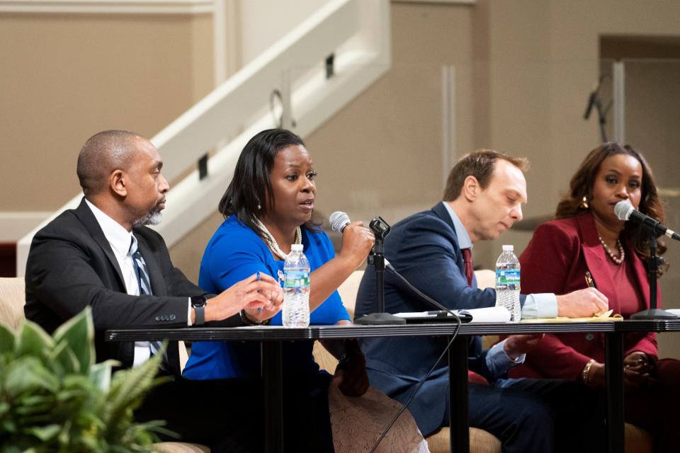 Delaware City Attorney, Natalia Harris, answers questions from the audience Thursday during the debate among candidates running for Franklin County prosecutor.