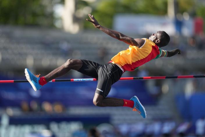 Valentin Ndzana leaps over the pole.
