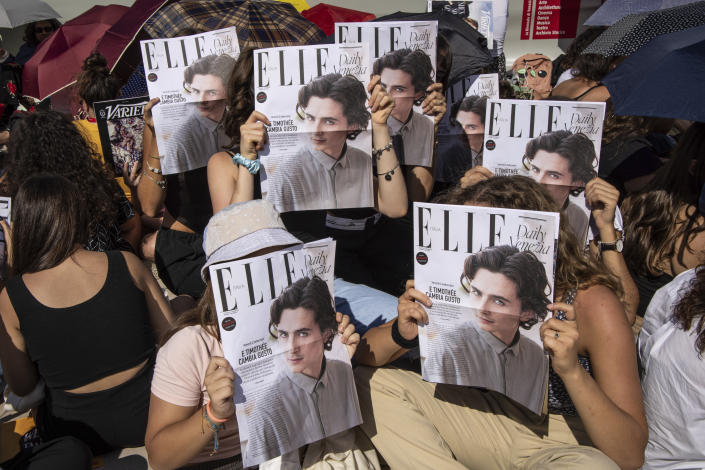 Fans congregate in front of the red carpet ahead of the film premiere of 'Bones and All', which stars Timothee Chalamet, during the during the 79th edition of the Venice Film Festival in Venice, Italy, Friday, Sept. 2, 2022. (Photo by Vianney Le Caer/Invision/AP)