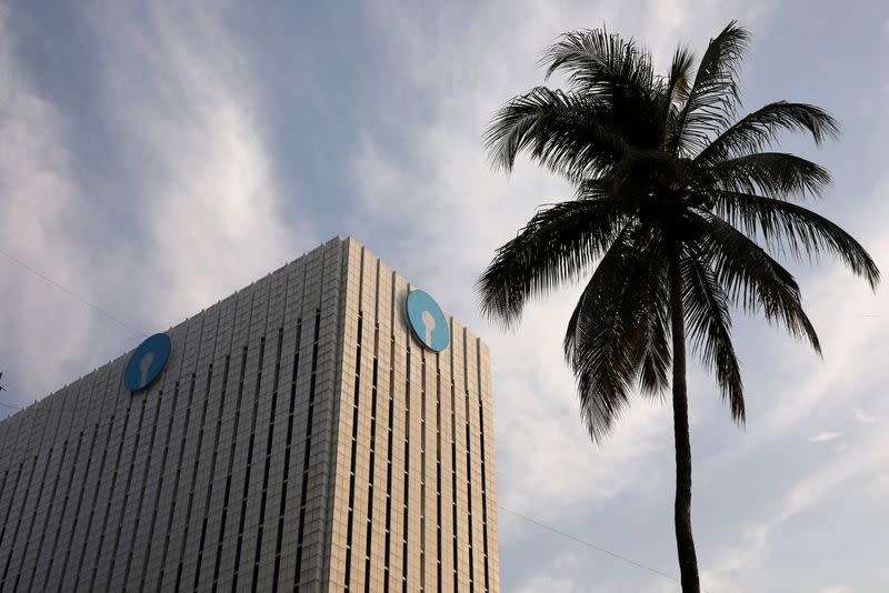 FILE PHOTO: The logo of SBI is seen on the facade of its headquarters in Mumbai