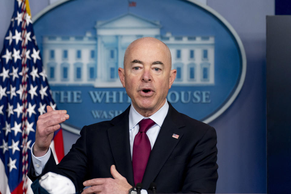 FILE - In this March 1, 2021, file photo, Homeland Security Secretary Alejandro Mayorkas speaks during a news conference at the White House in Washington. The Biden administration says four families who were separated at the Mexico border during Donald Trump’s presidency would be reunited in the United States during the first week of May, the first of what Mayorkas calls “just the beginning” of a broader effort. (AP Photo/Andrew Harnik, File)