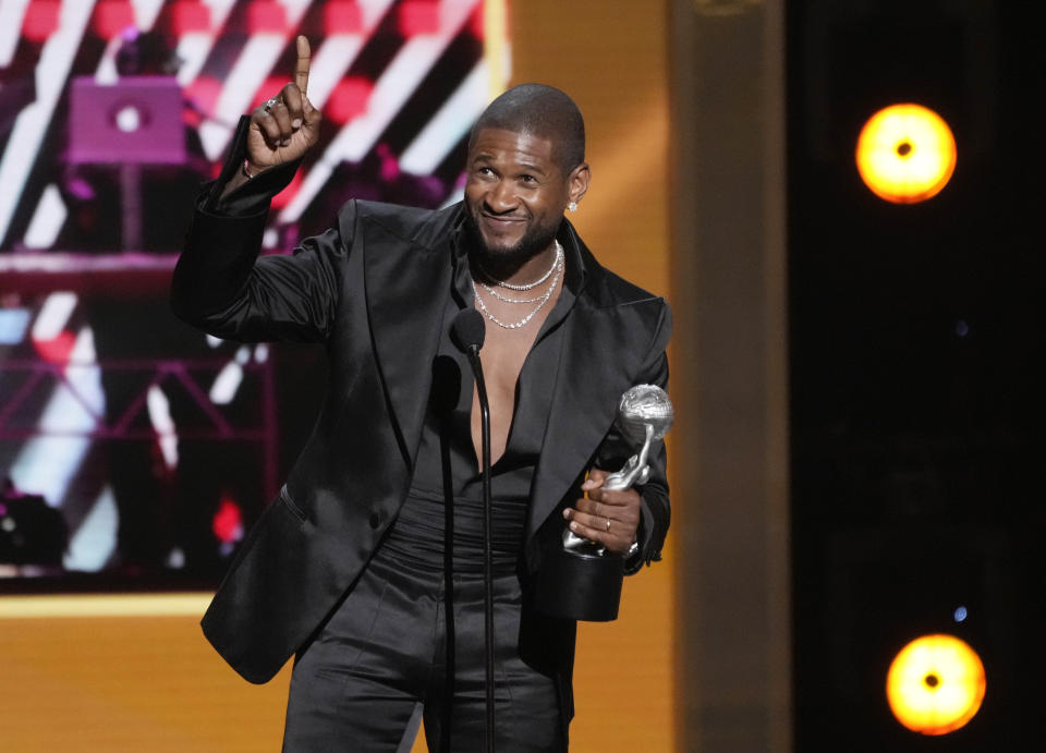 Usher addresses the audience after winning Entertainer of the Year during the 55th NAACP Image Awards, Saturday, March 16, 2024, at The Shrine Auditorium in Los Angeles. (AP Photo/Chris Pizzello)