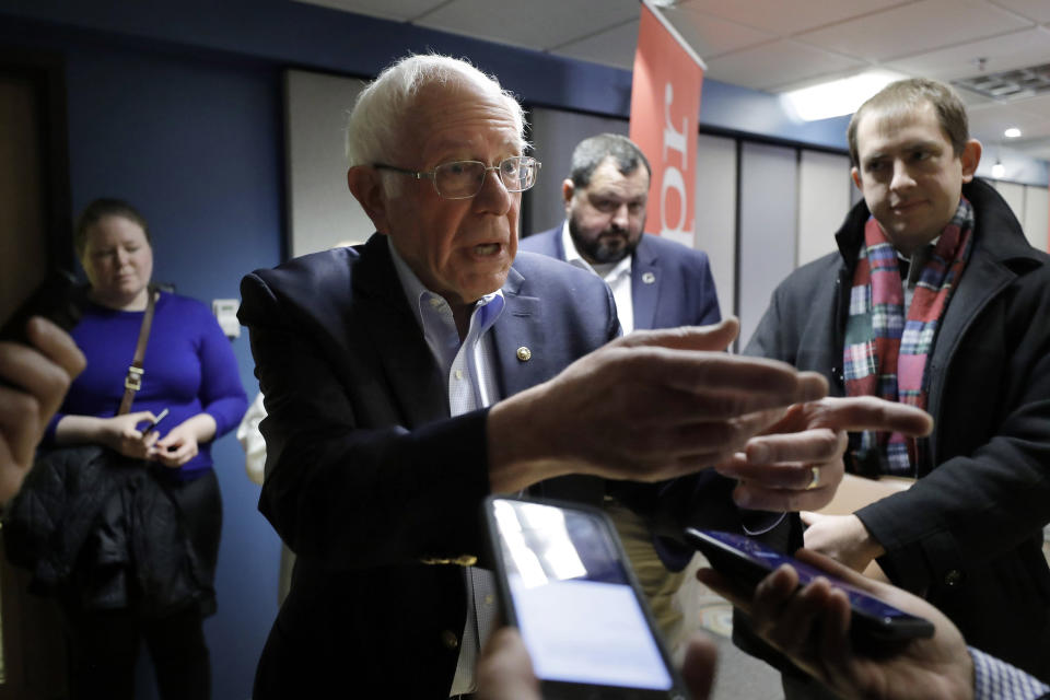Democratic presidential candidate Sen. Bernie Sanders, I-Vt., speaks with reporters following a forum broadcast on radio in a New Hampshire Public Radio station, Sunday, Jan. 19, 2020, in Concord, N.H. (AP Photo/Steven Senne)