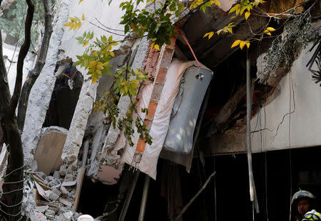 A collapsed building is seen after an earthquake in Mexico City, Mexico September 19, 2017. REUTERS/Henry Romero