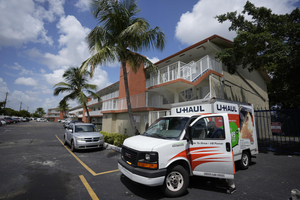 Freddie Davis climbs into a rented truck to drive his furniture and larger belongings to a storage shed, as he prepares for an eviction that could come at any time, Monday, Sept. 6, 2021, outside the ground floor one-bedroom apartment where he has lived for almost four years, in Miami. (AP Photo/Rebecca Blackwell)