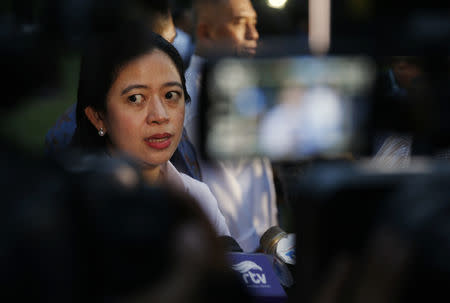 FILE PHOTO - Puan Maharani, a daughter of former president Megawati Sukarnoputri, speaks with the media after she was named coordinating minister for human development and culture by President Joko Widodo at the presidential palace in Jakarta October 26, 2014. REUTERS/Darren Whiteside