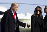 President Donald Trump, with first lady Melania Trump, boarding Air Force One during departure, Sunday, Feb. 23, 2020, at Andrews Air Force Base, Md. Trump is traveling to India. (AP Photo/Alex Brandon)