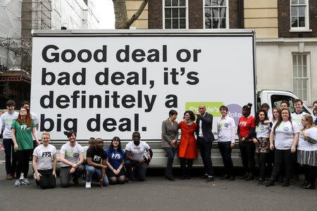 Labour Party MP Chuka Umunna, Liberal Democrat MP Layla Moran and Green MP Caroline Lucas stand with activists as they pose at the launch of the Peoples Vote advertising campaign in London, Britain, April 15, 2018. REUTERS/Simon Dawson