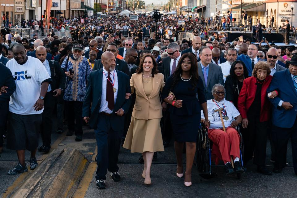 Vice President Kamala Harris (center) marched across the Edmund Pettus Bridge with civil rights activists to commemorate the 57th anniversary of 'Bloody Sunday' in Selma, Alabama on March 6, 2022.  Harris, who is leading White House efforts to protect voting rights, said earlier this year, “We are fighting, all of us, together every day to safeguard and to strengthen the freedom to vote.’’