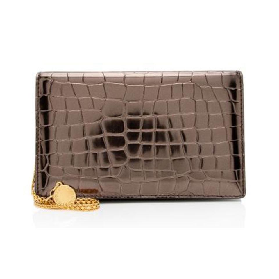 <p><a href="https://go.redirectingat.com?id=74968X1596630&url=https%3A%2F%2Fwww.bagborroworsteal.com%2Fhandbags%2Fstella-mccartney-metallic-croc-embossed-faux-leather-crossbody-bag%2F194360%2F3165%2F1269596%26posRow%3D2%26posCol%3D2%26page%3D4&sref=https%3A%2F%2F" rel="nofollow noopener" target="_blank" data-ylk="slk:Shop Now;elm:context_link;itc:0;sec:content-canvas" class="link ">Shop Now</a></p><p>Crossbody Bag</p><p>bagborroworsteal.com</p><p>$595.00</p>