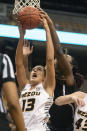 Missouri's Hannah Schuchts, left, pulls down a rebound in front of South Carolina's Aliyah Boston, left, during the first half of an NCAA college basketball game Thursday, Jan. 16, 2020, in Columbia, Mo. (AP Photo/L.G. Patterson)