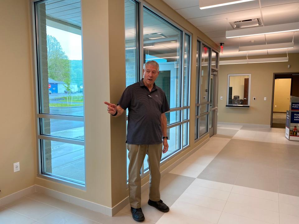 Jeff Geesaman, township manager, talks about the features of the new Washington Township municipal building while standing in the lobby. He will retire July 28 and the project is his ‘last hurrah.’