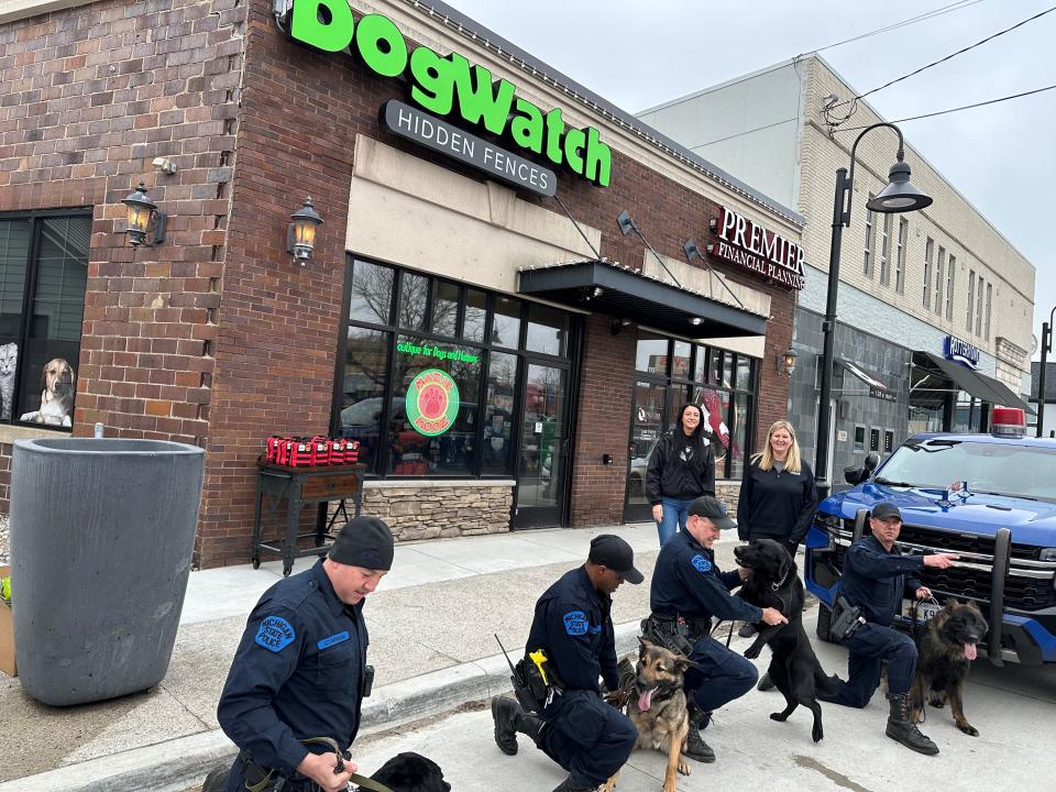 Michigan State Police troopers and their K-9s pick up medical kits donated to them by DogWatch in Brighton, Thursday, April 4, 2024