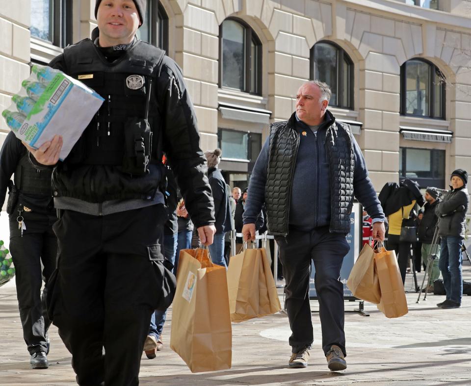 Chef Jose Andres (right), seen here delivering food to furloughed federal workers in 2019 during the longest government shutdown in U.S. history, is in now in Japan, where his team from World Central Kitchen is preparing meals for passengers and crews aboard the quarantined Diamond Princess.