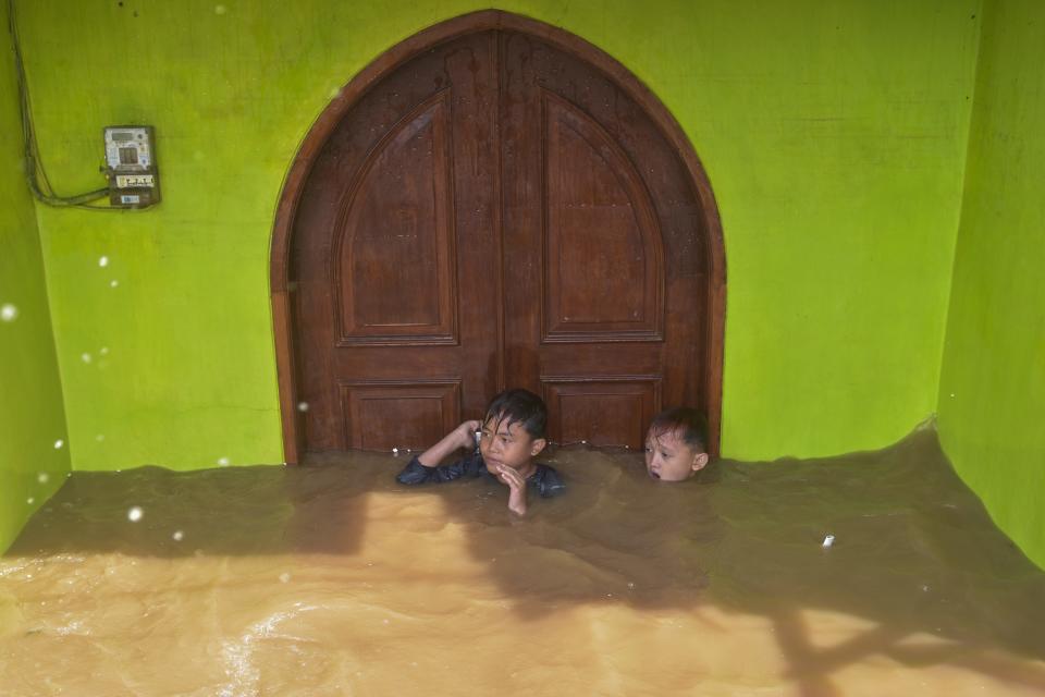 Boy in Jakarta floods