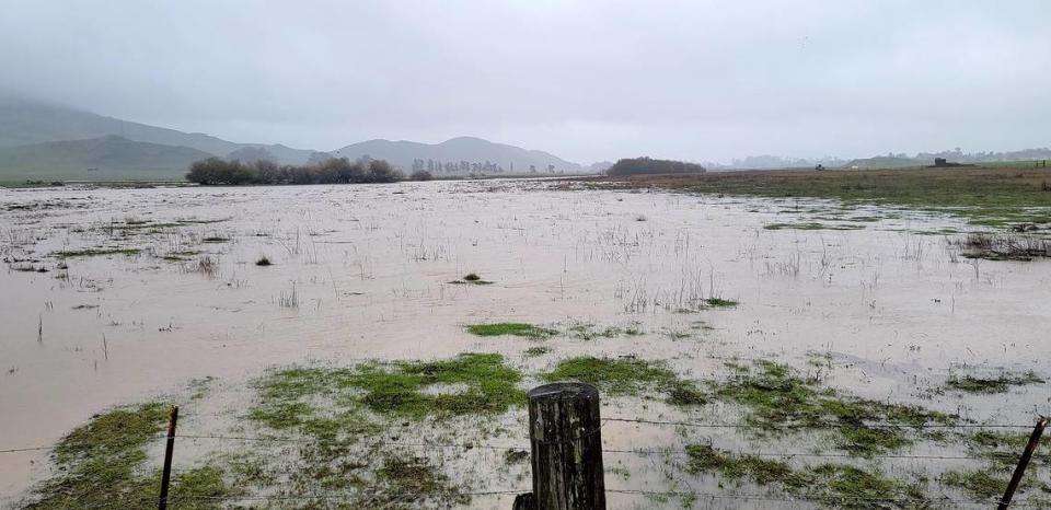 In San Luis Obispo, a ditch running along Foothill and O’Connor Way overflowed as of 4 p.m. on Saturday, Dec. 31, 2022, while the fields off of Foothill and Los Osos Valley Road filled with rain water.