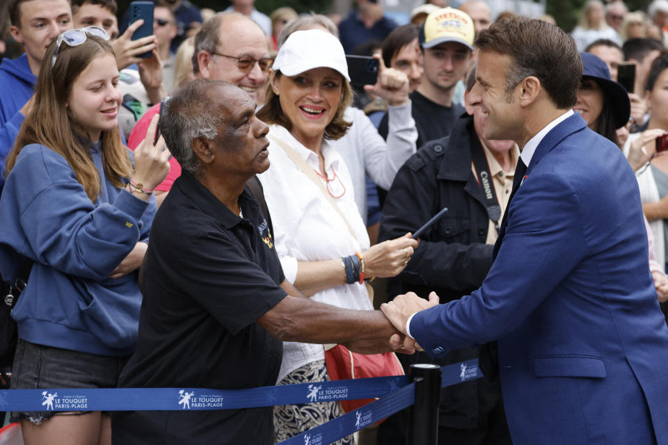 What majority in the French parliament will President Macron - seen here talking to supporters after casting his vote in Le Touquet in northern France on June 30 - have to work with in the future? The voters will decide this in the run-off election on July 7. (Photo by Ludovic Marin/AFP)