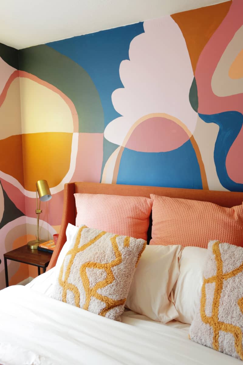 Colorful mural painted in bedroom.