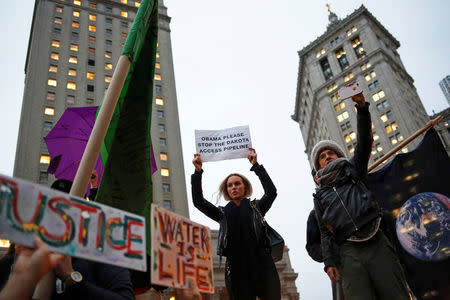 Demonstrators in New York gather to protest against plans to pass the Dakota Access pipeline near the Standing Rock Indian Reservation in North Dakota, U.S., November 15, 2016. REUTERS/Shannon Stapleton