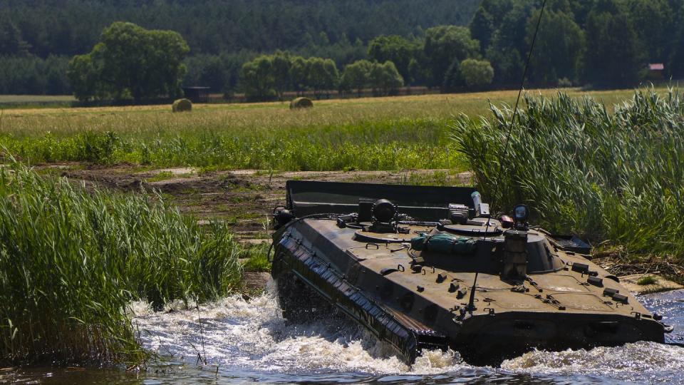 A Polish BWP-1 amphibious tracked infantry fighting vehicle demonstrates capabilities during training in Wierzbiny, Poland, on June 4, 2018. (Spc. Alan Prince/U.S. Army National Guard)