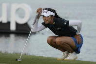Alison Lee lines up a putt on the 18th green during the third round of the LPGA CME Group Tour Championship golf tournament, Saturday, Nov. 18, 2023, in Naples, Fla. (AP Photo/Lynne Sladky)
