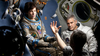 Sandra Bullock and George Clooney on the set of 'Gravity' (Warner Bros.)