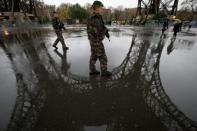 French soldiers patrol under the Eiffel Tower in Paris in November 2015