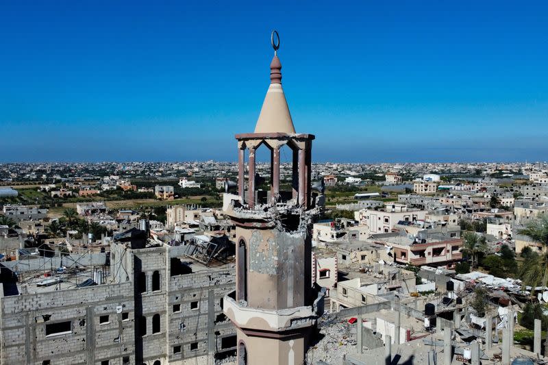 A mosque destroyed in Israeli strikes during the conflict lies in ruin, in Khan Younis