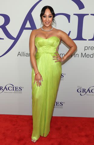 <p>Amy Sussman/Getty</p> Tamera Mowry-Housley attends the 49th Annual Gracie Awards Gala on May 21, 2024