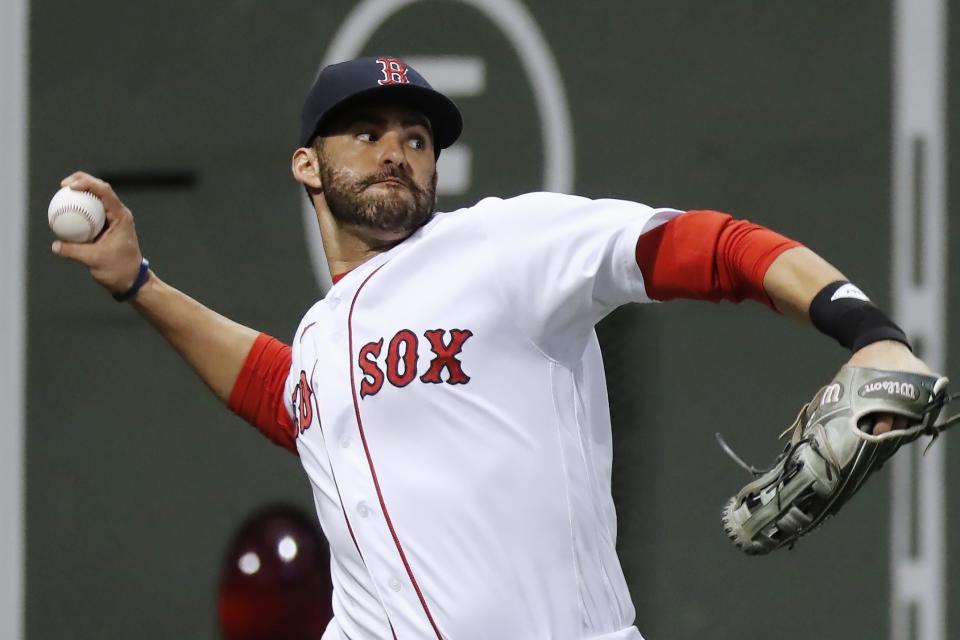 FILE - In this Friday, Sept. 18, 2020 file photo, Boston Red Sox's J.D. Martinez plays against the New York Yankees during the second inning of a baseball game in Boston. The Red Sox slugger J.D. Martinez says he was caught off guard leading up the pandemic shortened season, which threw off his regimen as he waited to see if there would even be baseball. But he isn’t going to make excuses for his worst hitting season as a major leaguer in 2020 .He’s vowed not to let it happen again this season and says he’s back to his normal routine as he enters spring training. (AP Photo/Michael Dwyer, File)