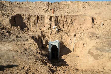 An entrance to what the Israeli military say is a cross-border attack tunnel dug from Gaza to Israel, is seen on the Israeli side of the Gaza Strip border near Kissufim January 18, 2018. REUTERS/Jack Guez/Pool