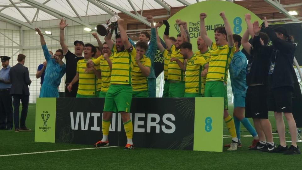 Norwich City CP team celebrating lifting the FA Disability trophy