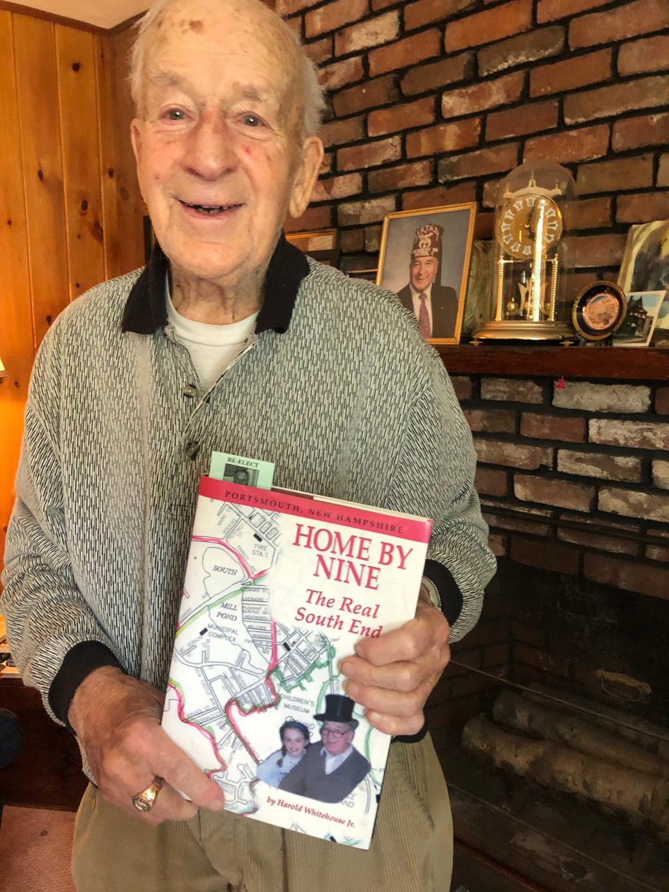 Harold Whitehouse Jr., pictured in his Portsmouth home, holds a copy of his book, "Home by Nine: The Real South End." He is hoping to reprint the book, and is interested in hearing from anyone who could help him do that. He estimates 250 copies would cost around $4,000.