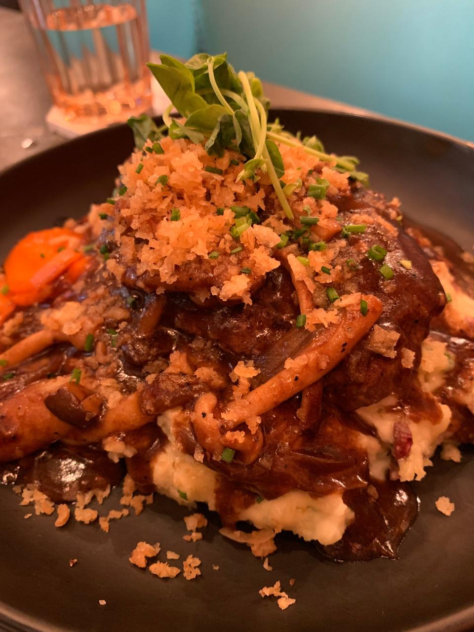 A Ghost Box surprise special was salisbury steak with butter and chive mash, crispy onions, honey-glazed carrots, mushrooms and mushroom and beef demiglace at Square Scullery in Akron.