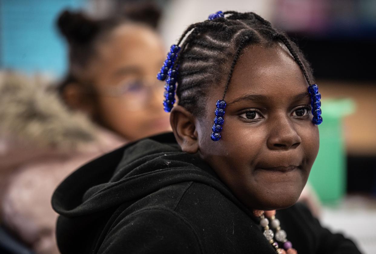 Ja'myla Smith, a fourth grader at the Cross Hill Academy, listens during a reading lesson Jan. 8, 2023.
