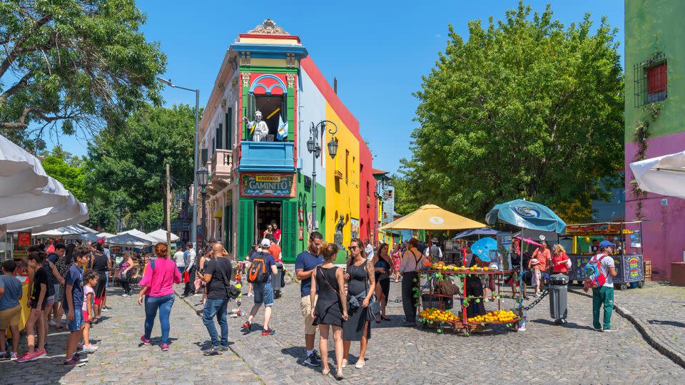 El Caminito is a colorful street in the La Boca district of Buenos Aires, Argentina. You'll need to be 18 or older to order a drink here. - Ian Dagnall/Alamy Stock Photo