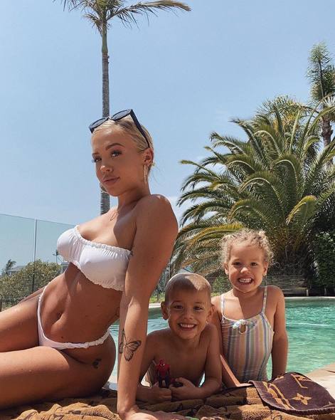 Tammy Hembrow and her kids, Saskia and Wolf at the pool.