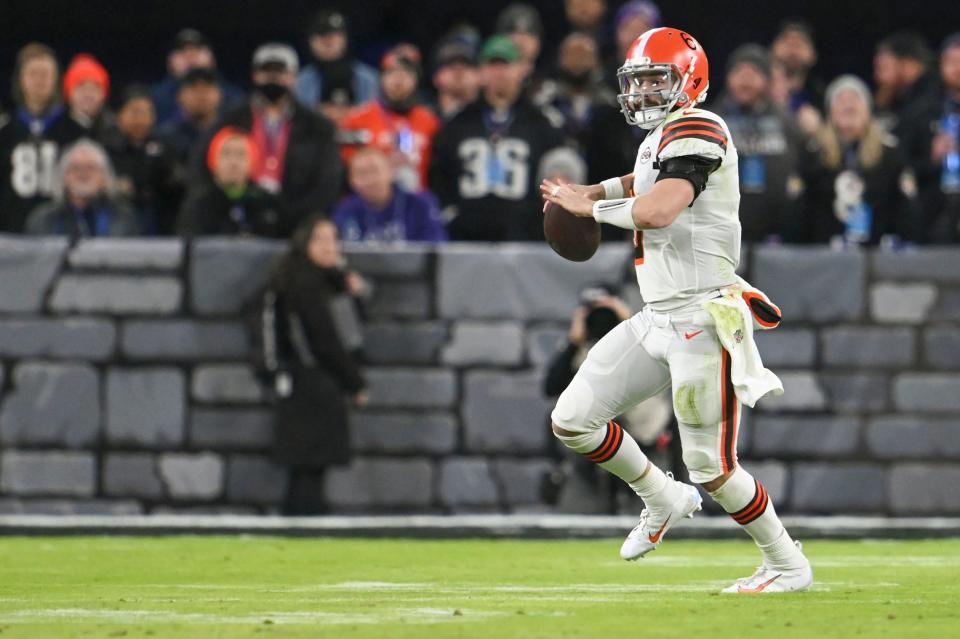 Nov 28, 2021; Baltimore, Maryland, USA;  Cleveland Browns quarterback Baker Mayfield (6) rolls out to throws during the first half against the Baltimore Ravens at M&T Bank Stadium. Mandatory Credit: Tommy Gilligan-USA TODAY Sports