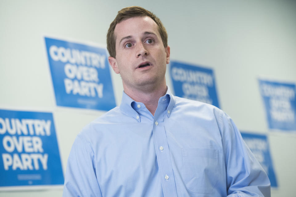 Dan McCready, Democratic candidate for North Carolina's 9th District, talks with voters at his campaign office during his education tour in Elizabethtown, North Carolina, in August. (Photo: Tom Williams via Getty Images)