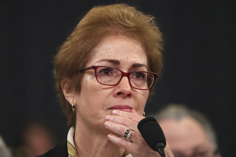 Former U.S. Ambassador to Ukraine Marie Yovanovitch listens as she testifies before the House Intelligence Committee on Capitol Hill in Washington, Friday, Nov. 15, 2019, during the second public impeachment hearing of President Donald Trump's efforts to tie U.S. aid for Ukraine to investigations of his political opponents. (AP Photo/Andrew Harnik)
