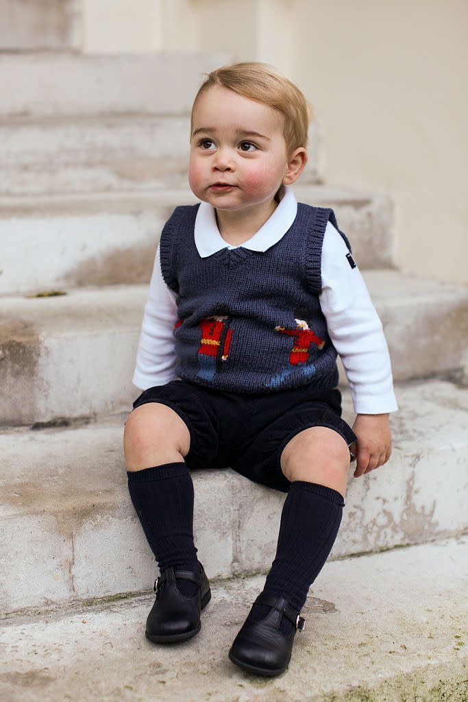 <p>How precious is this Christmas photo of Prince George, which was taken on the steps at Kensington Palace? The picture captures the youngster just a few months before he became a big brother to Princess Charlotte. </p>