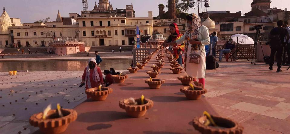 AYODHYA, INDIA - AUGUST 4: Earthen lamps laid out as part of decorations on the eve of the Ram Temple foundation laying ceremony on August 4, 2020 in Ayodhya, India. Prime Minister Narendra Modi will on Wednesday attend a public function on laying of the foundation stone of 'Shree Ram Janmabhoomi Mandir' at Ayodhya. Ram Janmabhoomi Teerth Kshetra, the trust set up for the construction and management of Ram temple, has invited 175 eminent guests for the foundation stone-laying ceremony after personally discussing with BJP veterans L K Advani and Murli Manohar Joshi, lawyer K Parasaran and other dignitaries. (Photo by Deepak Gupta/Hindustan Times via Getty Images)