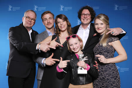 Cast members of the movie "Systemsprenger" (System Crasher) pose with Silver Bear Alfred Bauer Prize for a feature film, after the awards ceremony at the 69th Berlinale International Film Festival in Berlin, Germany, February 16, 2019. Christoph Soeder/Pool via Reuters