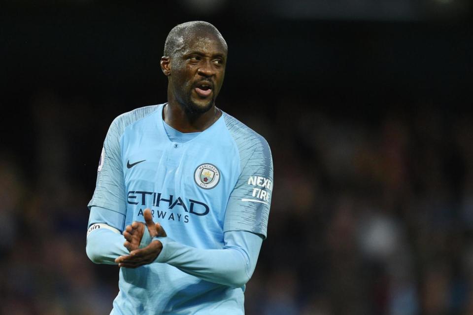 Success: Toure won seven trophies in his eight years at Manchester City (AFP)