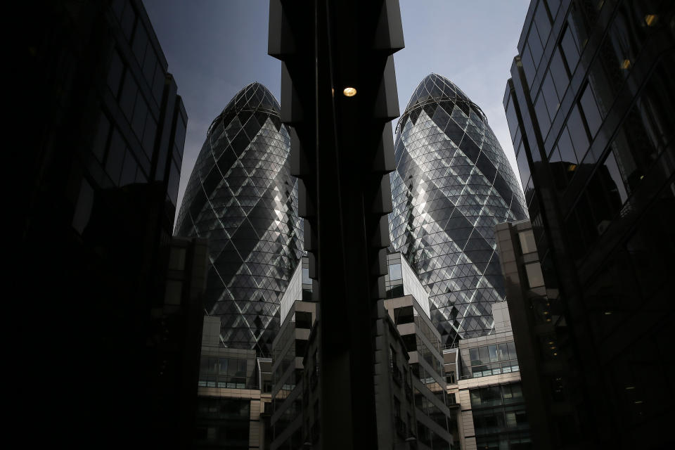 The 30 St Mary Axe skyscraper, which is known locally as "The Gherkin" is seen in London 